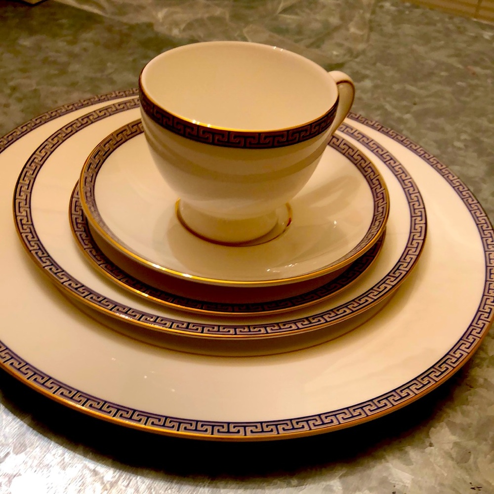 Wedge wood China 4 piece setting never been used.
